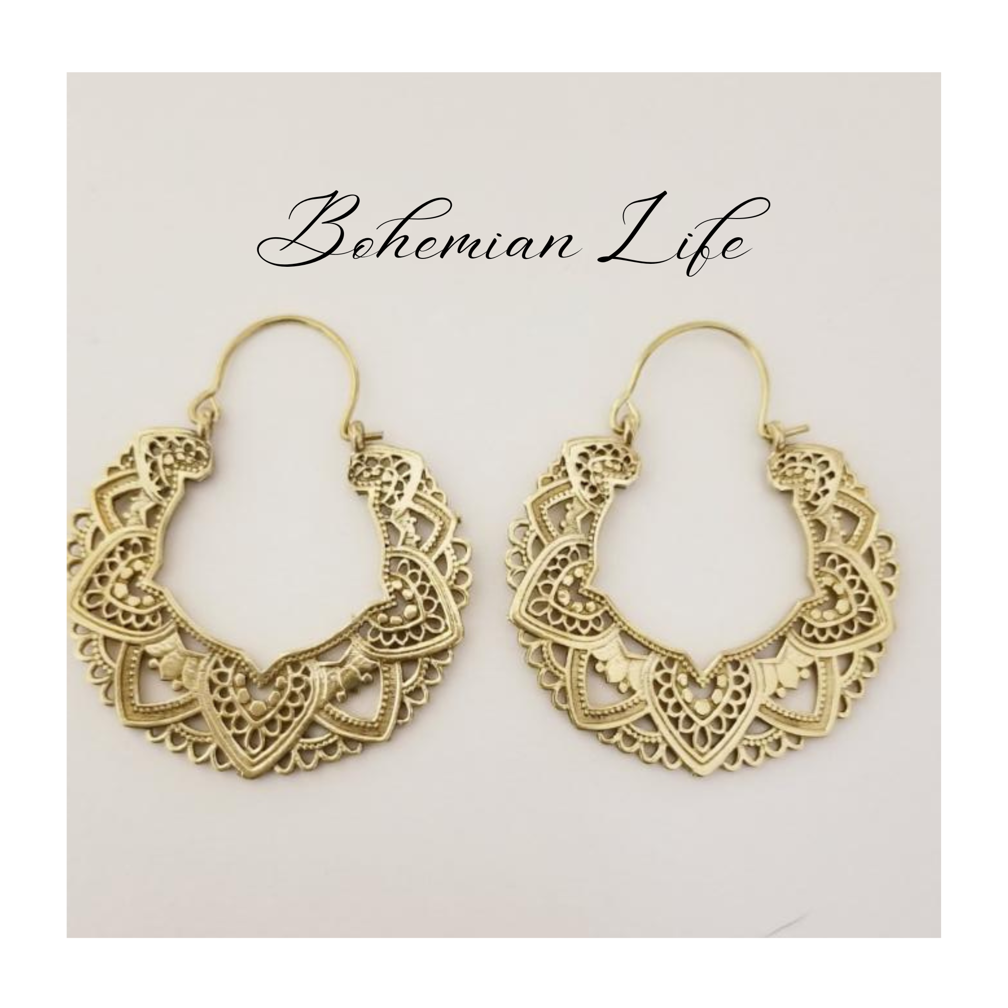 Gold hoop earrings with lacy filigree below the words "Bohemian Life"