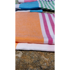 Over-sized, colorful bold stripes, our Mediterranean towel is beautifully hand-loomed with hand-tied fringe. 